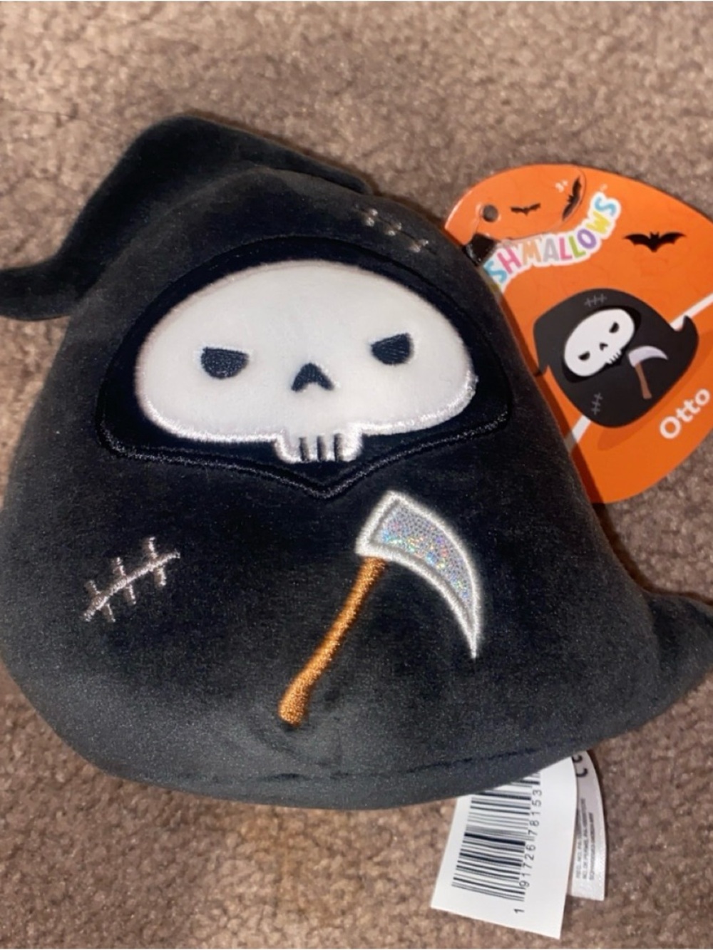 Squishmallows Otto Grim Reaper Plush - Black with White Face and Silver Scythe